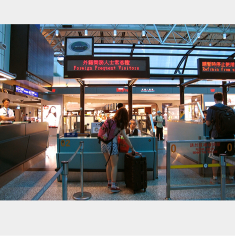 How do you say "Please go to the first green light counter.(At airport