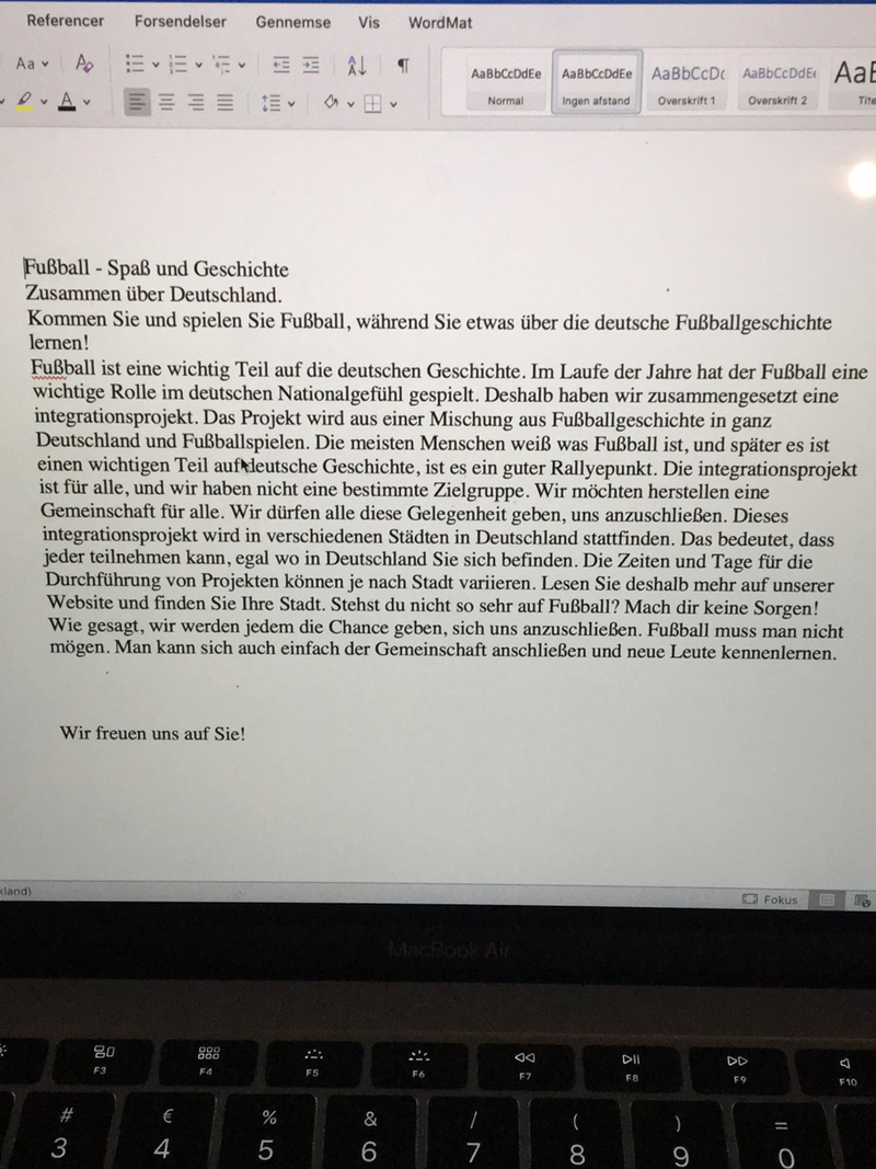 assignment to auf deutsch